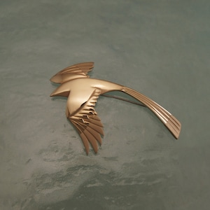 magpie pin, bronze