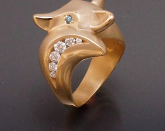 18 k fox ring  with diamonds