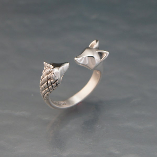 curious hedge hog / fox in  silver