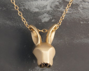 bunny pendant , bronze