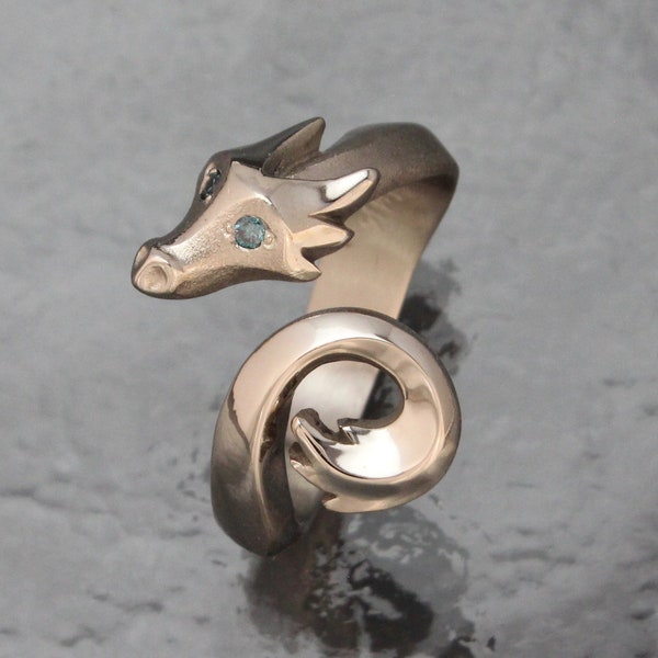 dragon ring ,diamond eyes. feathertail.  sterling silver