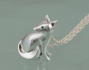 sitting kit fox pendant ,   silver.  pick finish and eye color