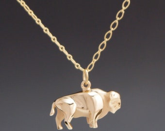 bronze  buffalo   charm or pendant