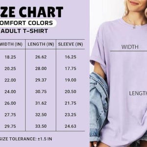 May include: Size chart for Comfort Colors adult t-shirts. The chart shows sizes S to 4XL with width, length, and sleeve measurements in inches. The image also shows a person wearing a lavender t-shirt.