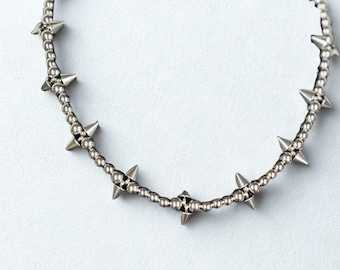 WINOMO Mano di scheletro punk catena dita bracciale schiava anello (argento