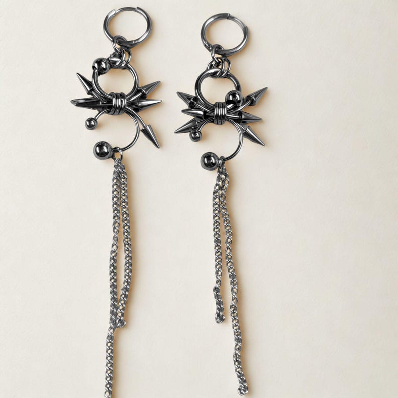 punk rivet chainmail earrings close up – grunge metal fashion accessory