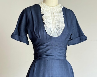 vintage 1950s wackelkleid in marineblau