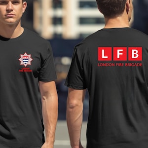 May include: Black crew neck t-shirts with the London Fire Brigade logo on the front and back. The front logo is a red and white emblem with the words "LONDON FIRE BRIGADE" below it. The back of the shirt has the letters "LFB" in red boxes and the words "LONDON FIRE BRIGADE".