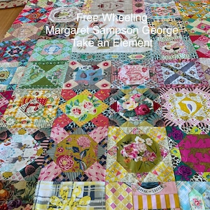 Może przedstawiać: Kolorowy patchwork z różnorodnymi wzorami i tkaninami. Patchwork składa się z kwadratów i prostokątów i zawiera różne kolory, w tym różowy, żółty, zielony, niebieski i czerwony. Patchwork nosi tytuł "Free Wheeling Margaret Sampson George Take an Element".