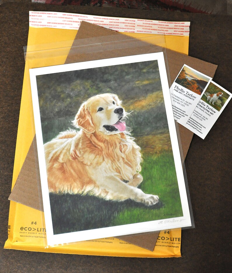 May include: A watercolor painting of a golden retriever dog lying down in a grassy field. The dog is looking up and has its tongue sticking out. The painting is signed by the artist.