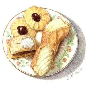 May include: A plate with a floral design holds three pastries: two round cookies with chocolate centers and a long, filled pastry. The cookies are light brown and the pastry is a darker brown.