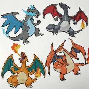 May include: Four embroidered patches featuring dragon-like creatures in various poses. The patches showcase dragons in shades of orange, gray, and blue, with flames and wings. The designs are detailed and colorful, suitable for apparel.