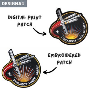 May include: Two patches with a space theme. The top patch is a digital print, and the bottom is embroidered. Both patches feature a spaceship design with the text "PROJECT HAIL MARY" and a burst of orange and yellow light.