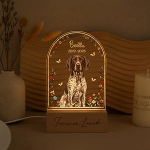 May include: A rustic wooden sign with the text "Welcome to our home" in white lettering. The sign features a distressed finish and a simple, inviting design, perfect for a front porch or entryway.