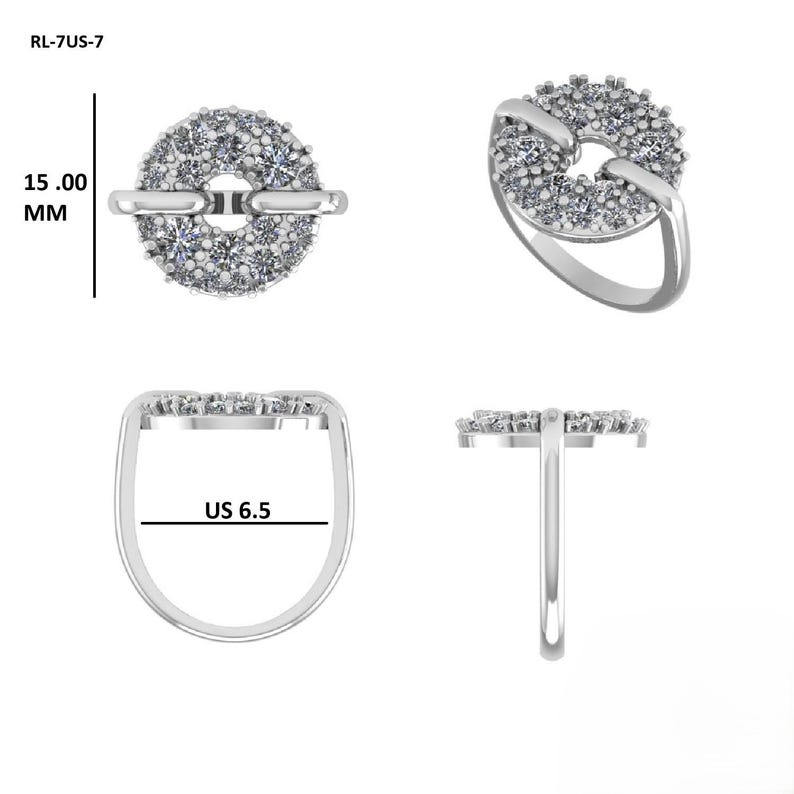 May include: A silver ring with a circular design encrusted with small, clear gemstones. The ring features a band and a connecting bar. The ring size is US 6.5, and the circular design is 15.00 mm in diameter.