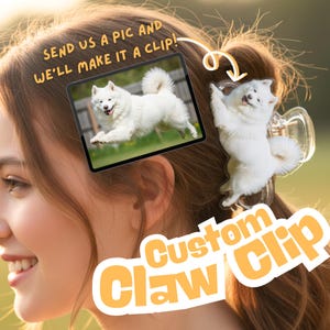 May include: A clear claw clip featuring a white dog design. The image also shows a tablet with a picture of a white dog and the text "SEND US A PIC AND WE'LL MAKE IT A CLIP!" and "Custom Claw Clip".