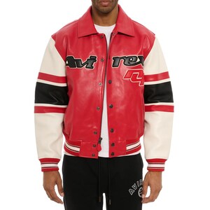 May include: Red leather jacket with white sleeves and black accents. The jacket features the text "Avi Rex" in black lettering on the chest and a number "4". The jacket has a button-up front and ribbed cuffs.