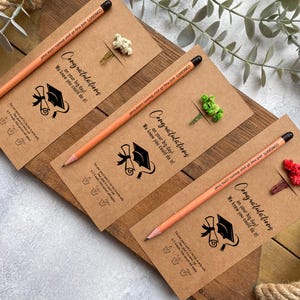 There are flowers and a pencil with seeds on the card.