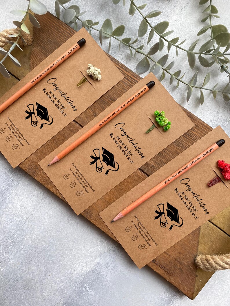 There are flowers and a pencil with seeds on the card.