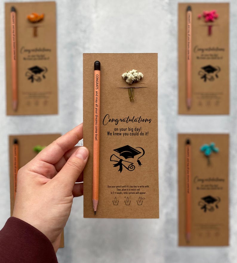 There are flowers and a pencil with seeds on the card.