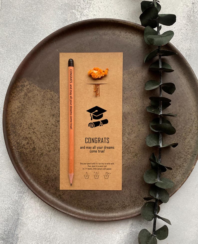 There are flowers and a pencil with seeds on the card.
