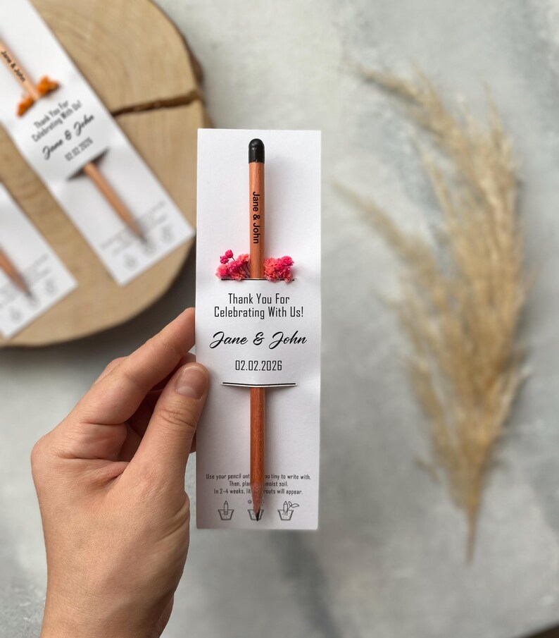 There are flowers and a pencil with seeds on the card.