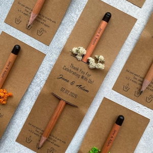 There are flowers and a pencil with seeds on the card.