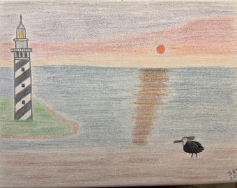 Charrán real y faro de concha marina