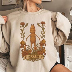 Retro Robert Help Sweatshirt Weirdcore Ästhetik Rundhalsausschnitt Lustig Botanische Kreatur Grafik Vintage Kuriositäten Meme