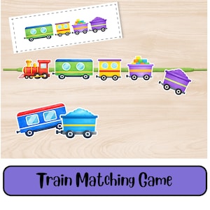 May include: A colorful train matching game with various train cars in green, yellow, purple, and blue. The text "Train Matching Game" is displayed on a purple banner at the bottom. The game is set on a light brown wooden surface.