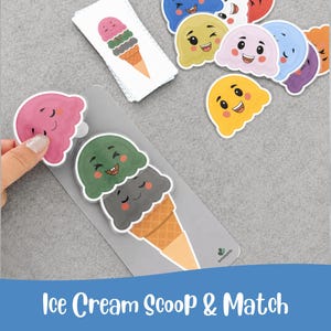 May include: A collection of colorful ice cream scoop matching game pieces. The image features various ice cream scoops with smiling faces, along with a matching cone. The text "Ice Cream Scoop & Match" is at the bottom of the image.
