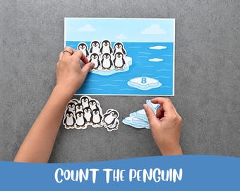 May include: An educational activity set featuring a blue ocean scene with a large iceberg and the number 8 printed on a smaller ice floe. The set includes multiple die-cut penguin figures and additional ice floe shapes for counting practice.