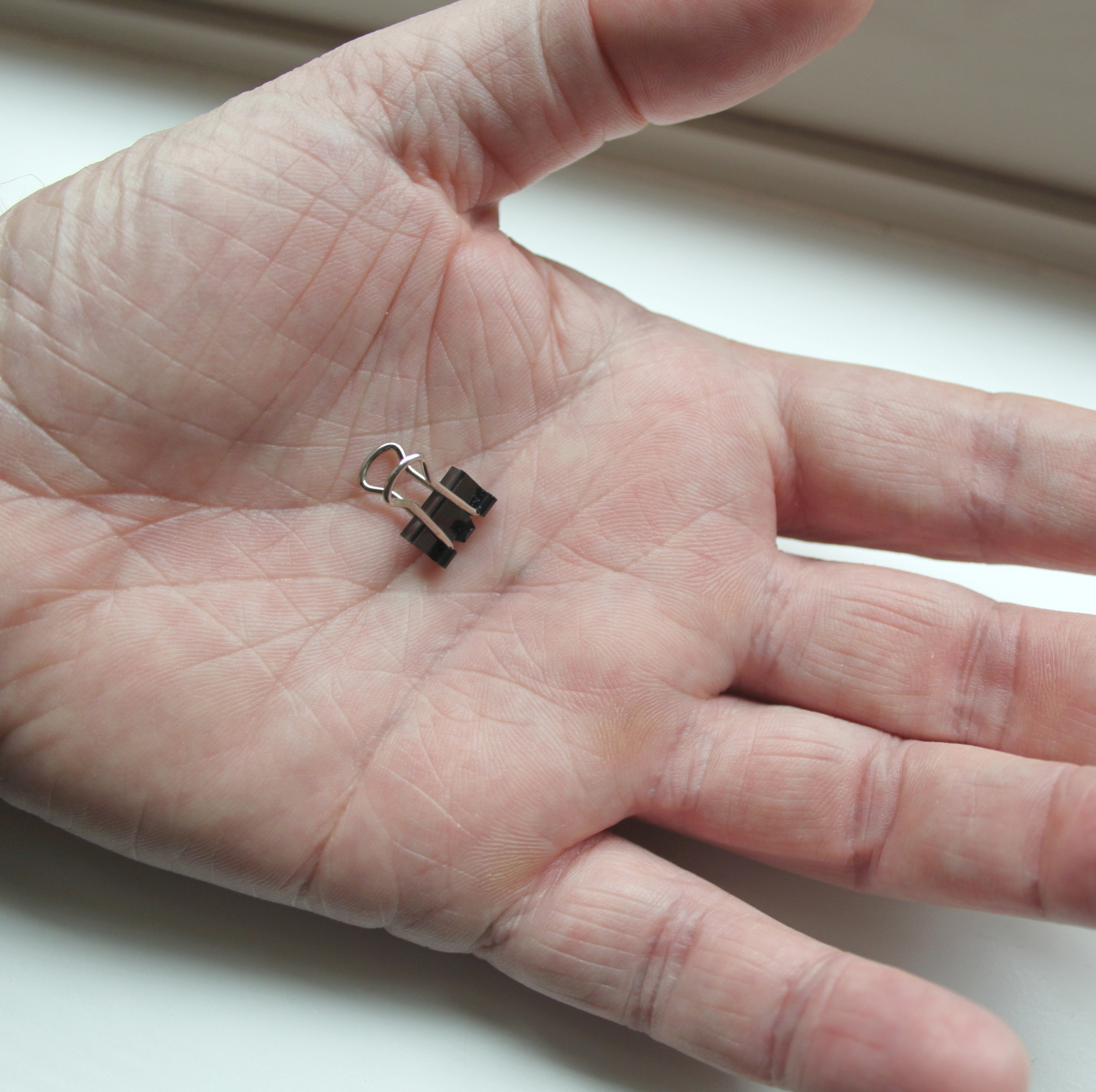 Tiny cheap binder clips
