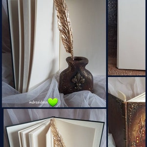 May include: A vintage-style journal with a gold feather bookmark. The journal has a dark brown leather cover with intricate gold detailing. The journal is open to reveal blank pages.