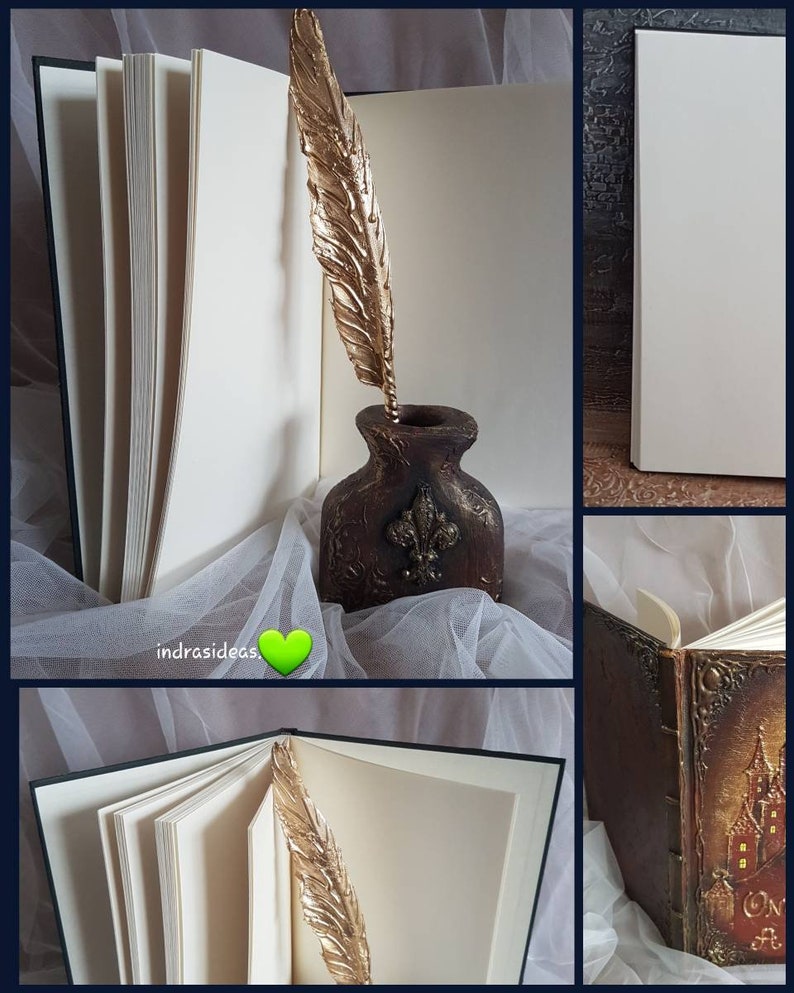May include: A vintage-style journal with a gold feather bookmark. The journal has a dark brown leather cover with intricate gold detailing. The journal is open to reveal blank pages.