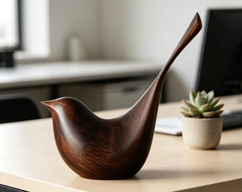 Scultura minimalista in legno a forma di uccello, ideale per arredare una scrivania moderna o per gli amanti degli uccelli.