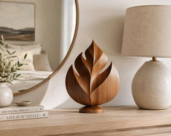 Scultura astratta a forma di foglia in legno, decorazione da scrivania per amanti della natura e dello stile minimalista.