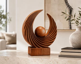 Scultura astratta in legno a forma di onda, ideale per decorare mensole moderne e come regalo per gli amanti dell'arte.
