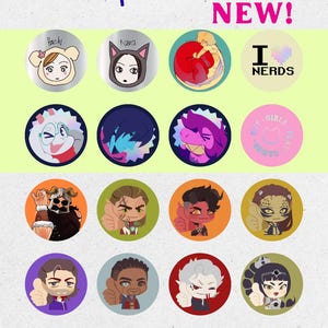 May include: A collection of sixteen circular button pins arranged in a grid. The pins feature various illustrated characters, including figures with animal ears, fantasy creatures, and text that reads button pins, NEW!, and I heart NERDS.