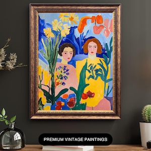 May include: A framed vintage painting depicting two women surrounded by flowers in vivid colours. The artwork uses blues, yellows, pinks, and reds. The frame is a warm, ornate gold. The text "PREMIUM VINTAGE PAINTINGS" is at the bottom.