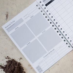 May include: A white spiral-bound garden planner page featuring sections for Seasonal To Do, Winter, Autumn, Summer, Spring, and a Compost Bin Record table. The page includes text fields for Last Frost, First Frost, and My main goal this year.