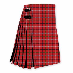 May include: A red tartan kilt with a black and white plaid pattern. The kilt features two black leather straps with silver buckles. The pleated design is visible on the left side of the kilt.