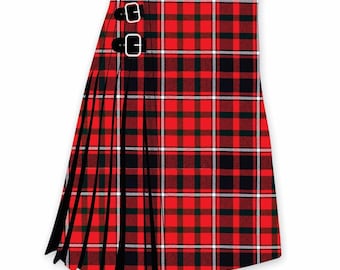 May include: A traditional Scottish kilt in a red, black, and white tartan pattern. The kilt features pleats and two leather straps with silver buckles. The fabric has a classic plaid design, suitable for formal events or cultural celebrations.