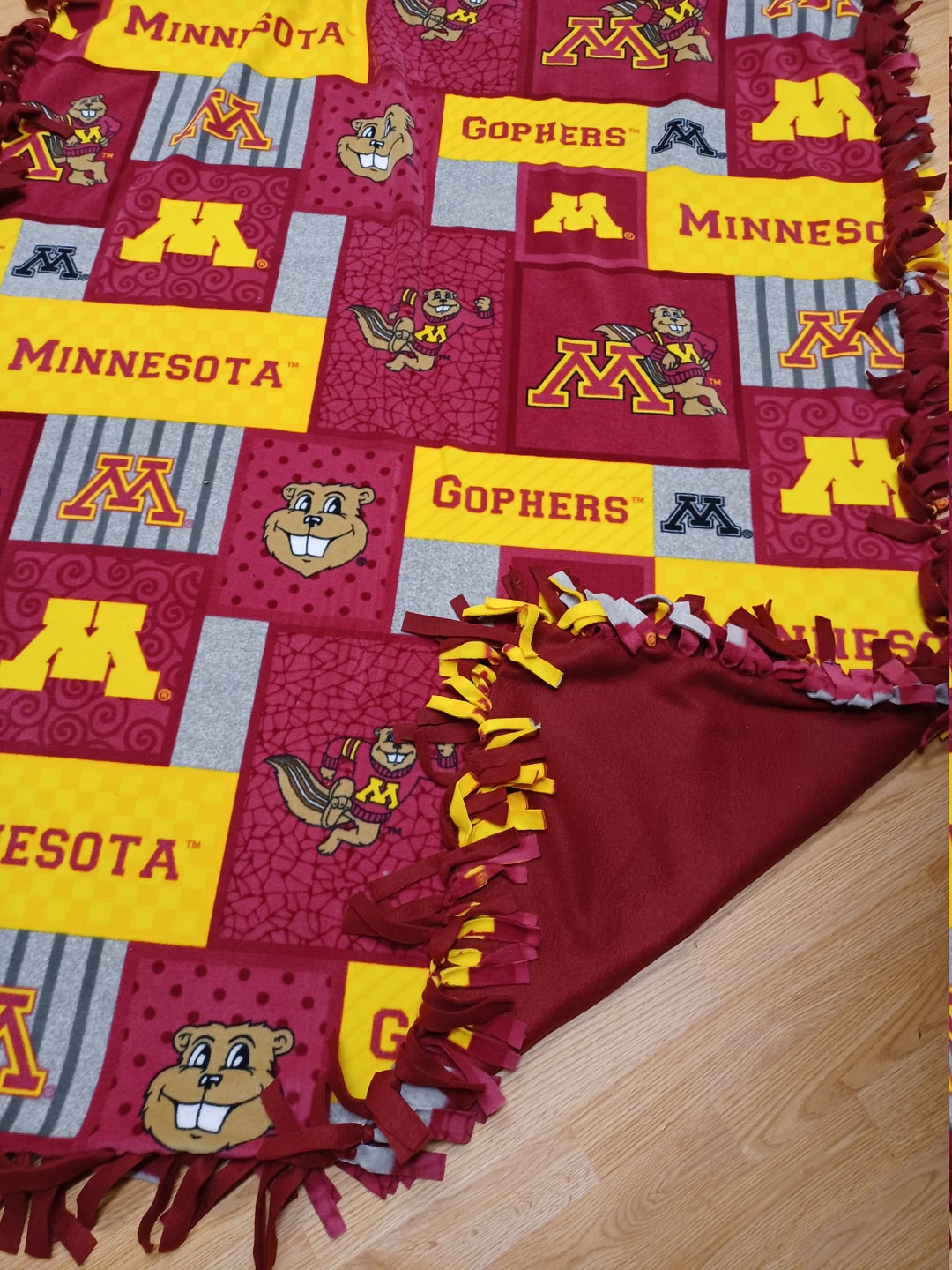 Gopher de la Universidad de Minnesota Manta reversible de forro polar