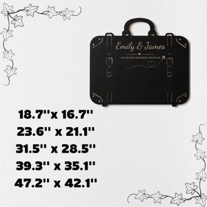 May include: A black suitcase-shaped wall sign featuring the engraved names Emily & James, the text COLLECTING MEMORIES TOGETHER, an airplane icon, and a dotted flight path. Available in sizes 18.7"x 16.7", 23.6"x 21.1", 31.5"x 28.5", 39.3"x 35.1", and 47.2"x 42.1".