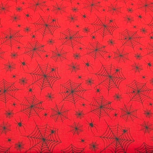 Black Spiders and Spiderwebs on Orange Background Halloween Fabric By The Yard