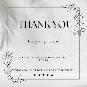 May include: A white card featuring the words "THANK YOU" in a bold, black font. The text "For your purchase" is below, followed by "WE REALLY APPRECIATE YOUR SHOPPING WITH US." and "ENJOY YOUR PURCHASE LEAVE A REVIEW" with five stars.