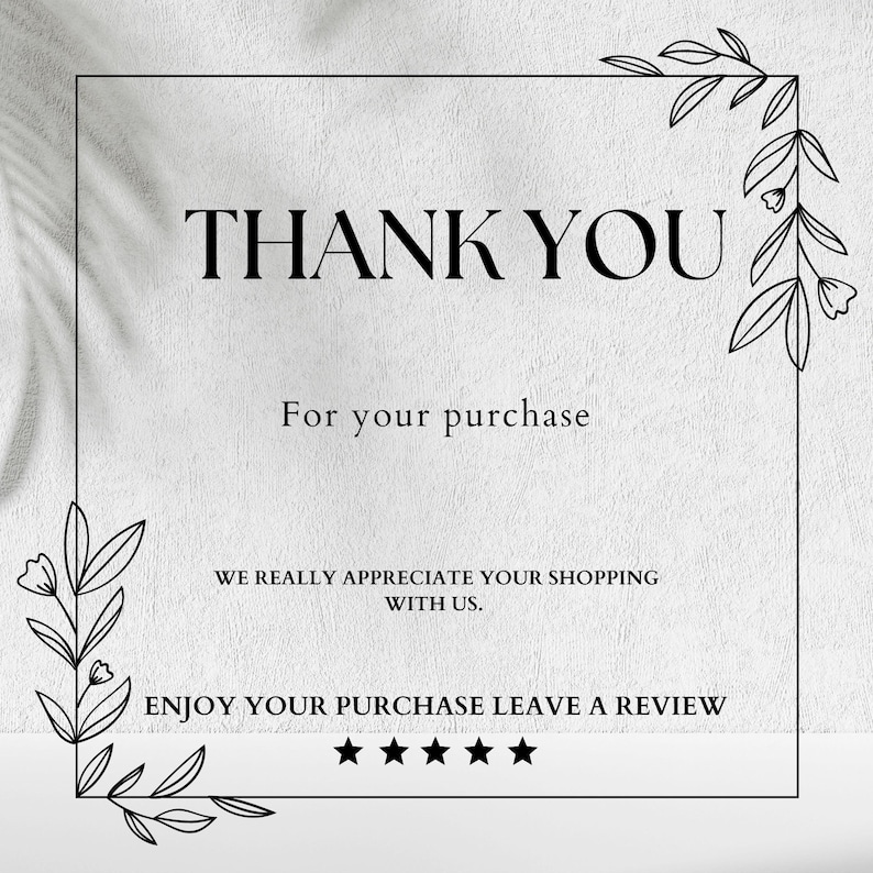 May include: A white card featuring the words "THANK YOU" in a bold, black font. The text "For your purchase" is below, followed by "WE REALLY APPRECIATE YOUR SHOPPING WITH US." and "ENJOY YOUR PURCHASE LEAVE A REVIEW" with five stars.