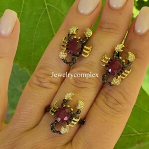 Conjunto de joyas con rubí natural, topacio blanco, pendientes de plata de ley 925 y anillo de plata de ley oxidada negra.
