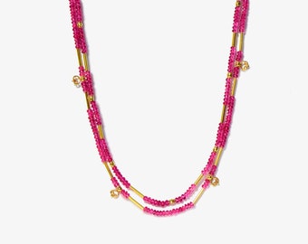 Girocollo/collana annodata con perline di rubellite in oro 18 carati